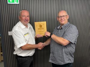 Roger Line receiving a national business award