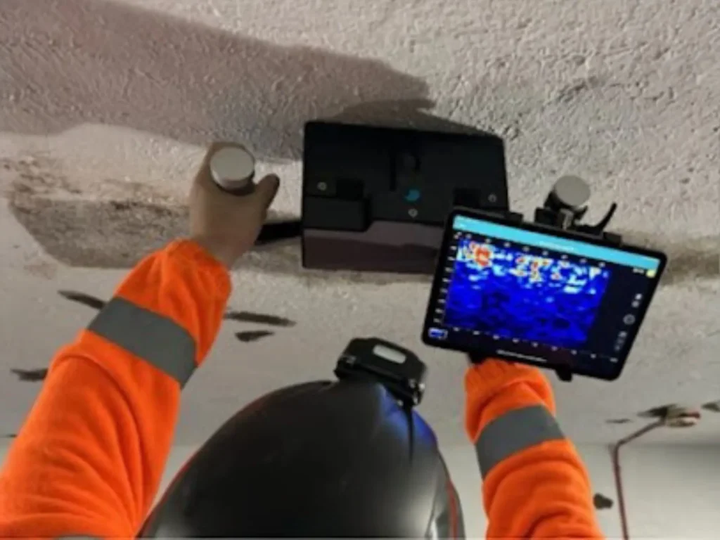 Modern Concrete Scanning: Transforming Building Inspections Through Advanced Technology Professional conducting ferro scanning with state-of-the-art ground penetrating radar equipment