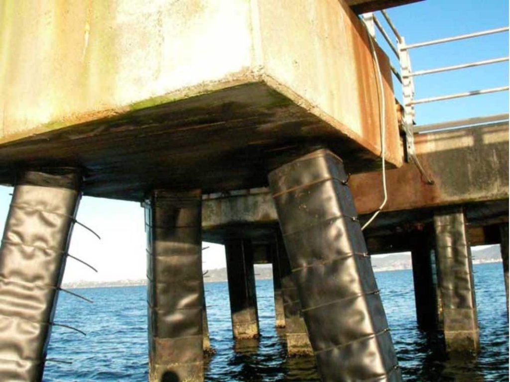 The Ultimate Guide to Marine Piling and Pile Protection: Innovative Solutions for Longevity and Durability Heavy_Duty Steel and Concrete Pile Protection System_Structural Repairs London