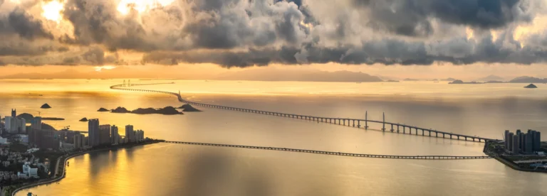 The World’s 10 Most Expensive Bridges – And What It Takes to Protect Them Golden sunset over a bridge